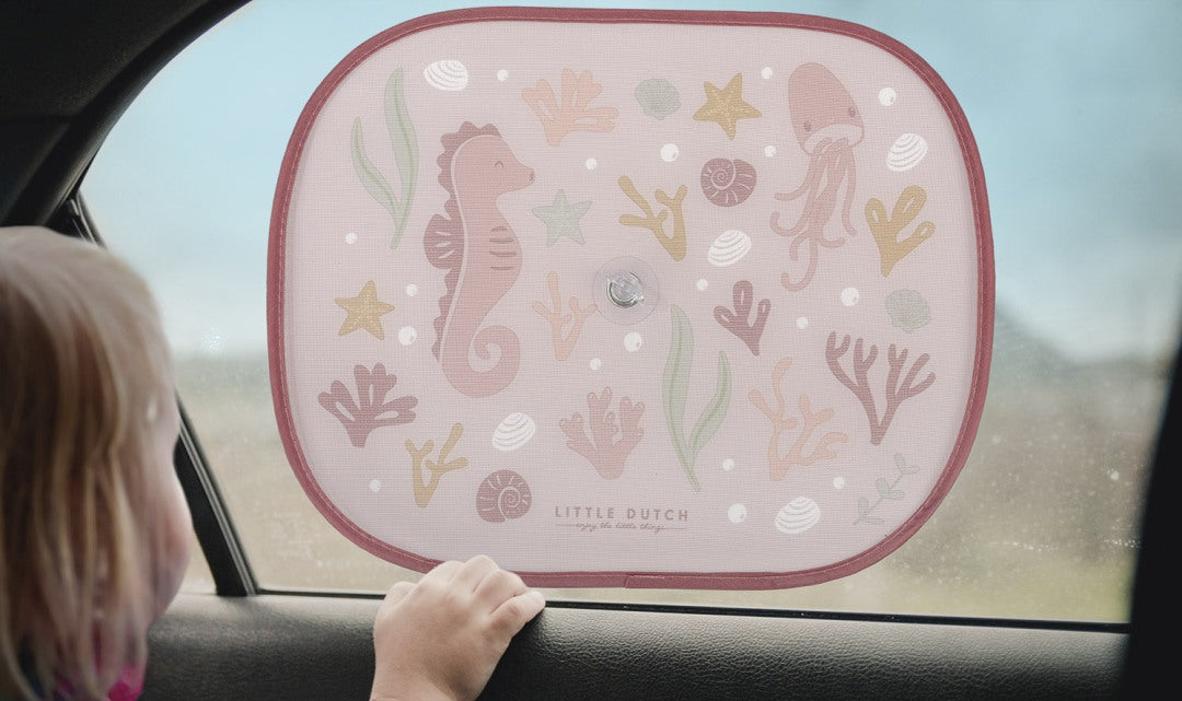 Kinder Sonnenschutz mit Ocean Dreams pink Motiv fuer optimalen UV Schutz im Auto