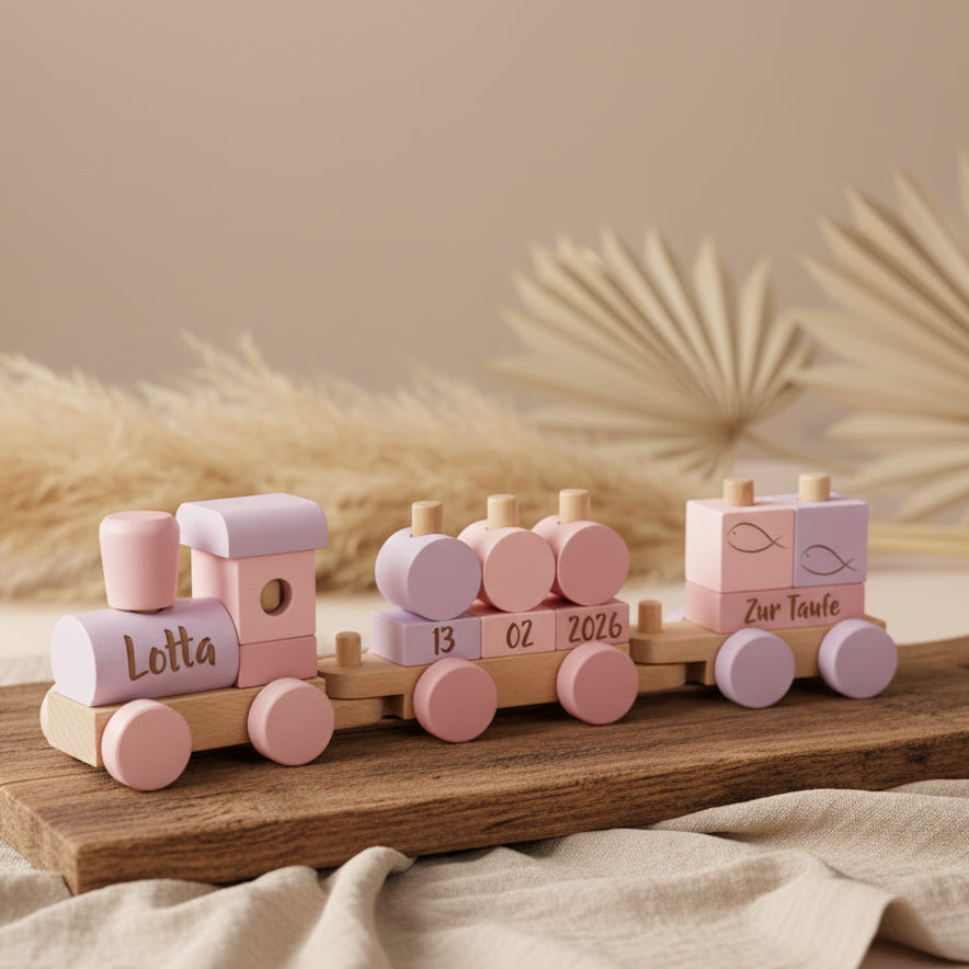 Personalisierter Holzzug in Rosa zur Taufe mit graviertem Namen, Taufdatum und Schriftzug Zur Taufe